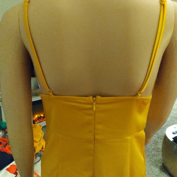 Golden yellow satin dress. Adjustable straps with a ruffle asymmetrical flare - Picture 7 of 9